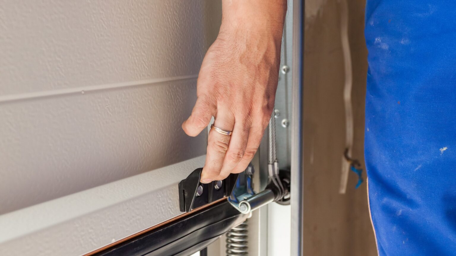 Signs Your Garage Door Tracks Are Misaligned And What Caused It